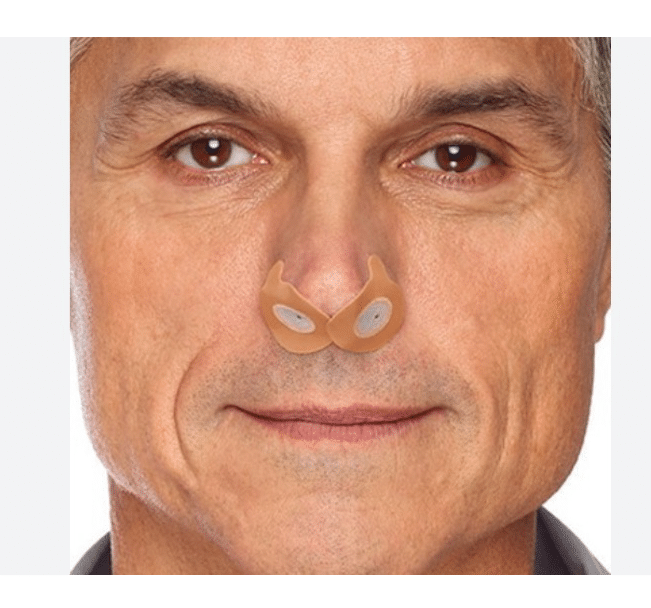 Man wearing nasal resistors