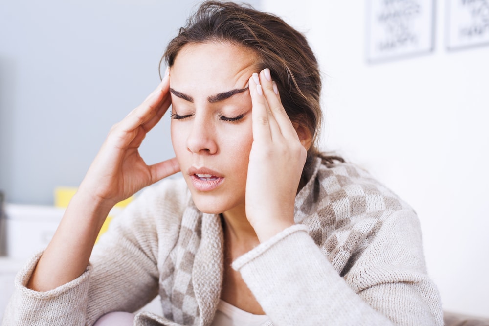 Woman experiencing a tension headache