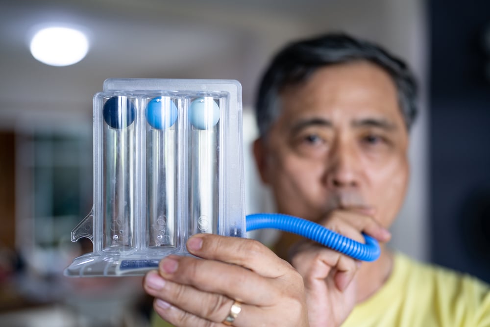 man taking a lung function test