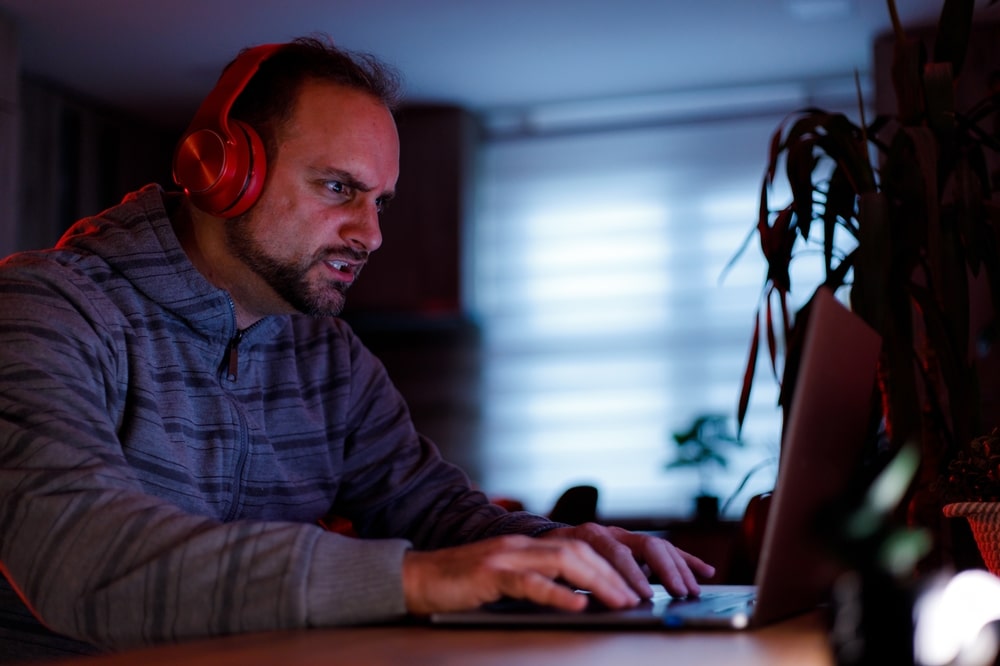 Gamer clenching his teeth