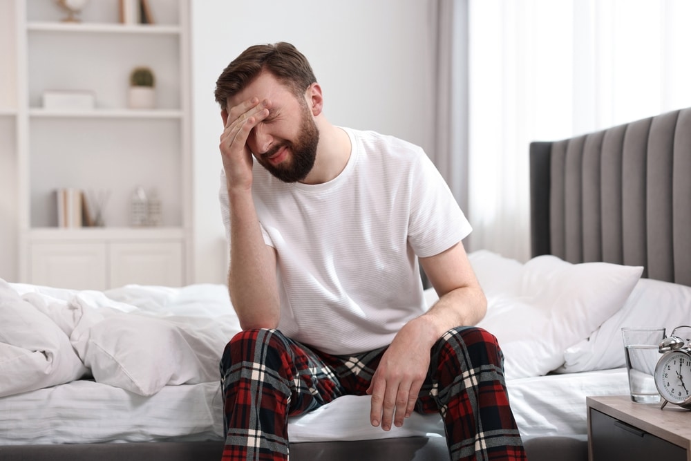 man with morning headache